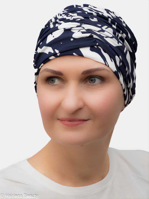 Soft, stretchy turban in vibrant colors for alopecia and hair loss.