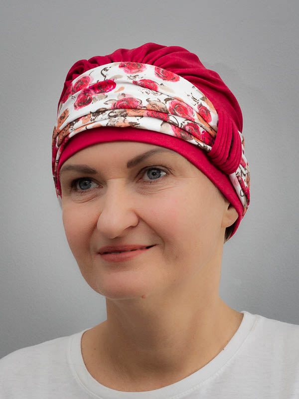 Stylish bamboo, red hat featuring a bright, colorful headband for cancer and chemo patients