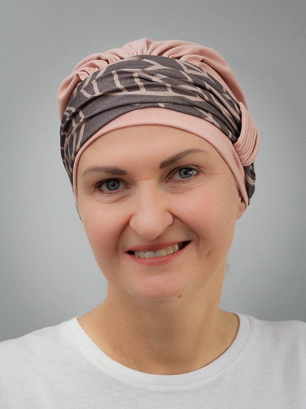 Lightweight bamboo, peach hat with a band around the head, ideal for hair loss and sensitive skin