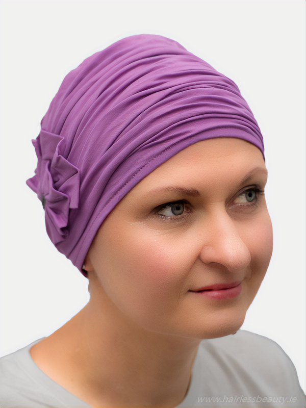 Delicate bamboo turban with soft lining and elegant drape, offering both comfort and style, suitable for alopecia and sensitive scalps