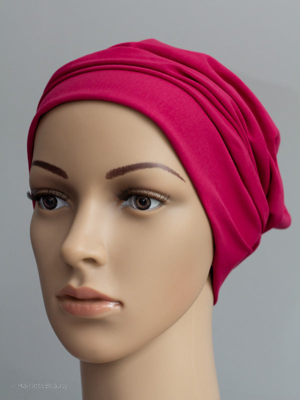 Breathable and light beanie hat with no lining, designed to keep the head warm and comfortable during cancer treatment