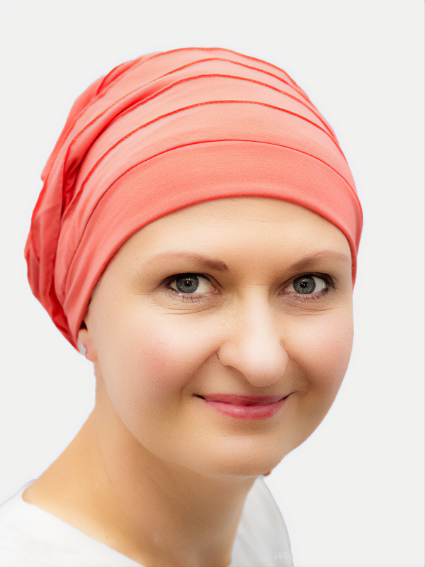 Comfortable peach beanie hat, loose fit and stylish for chemo patients